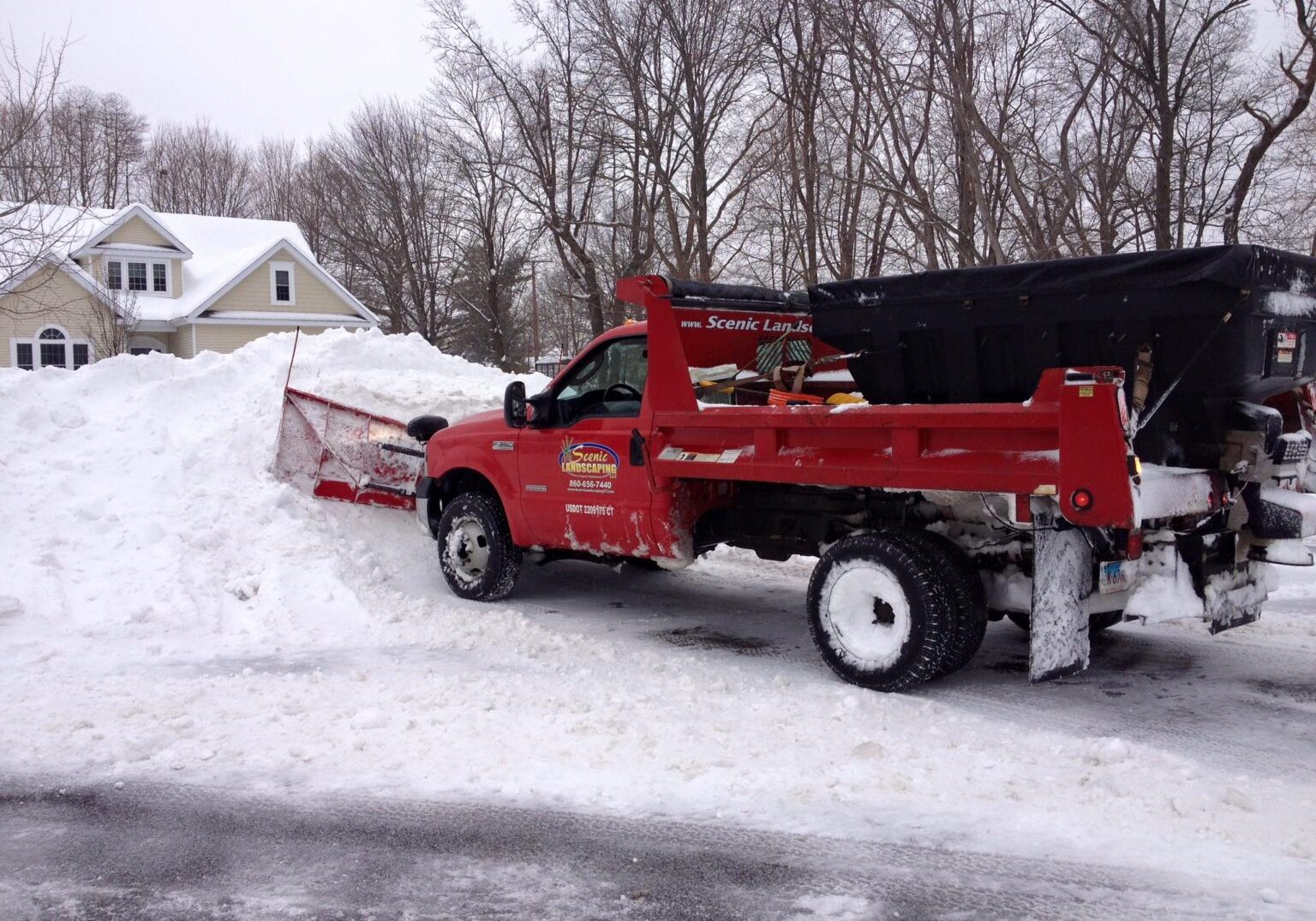 truck with mounted snowplow